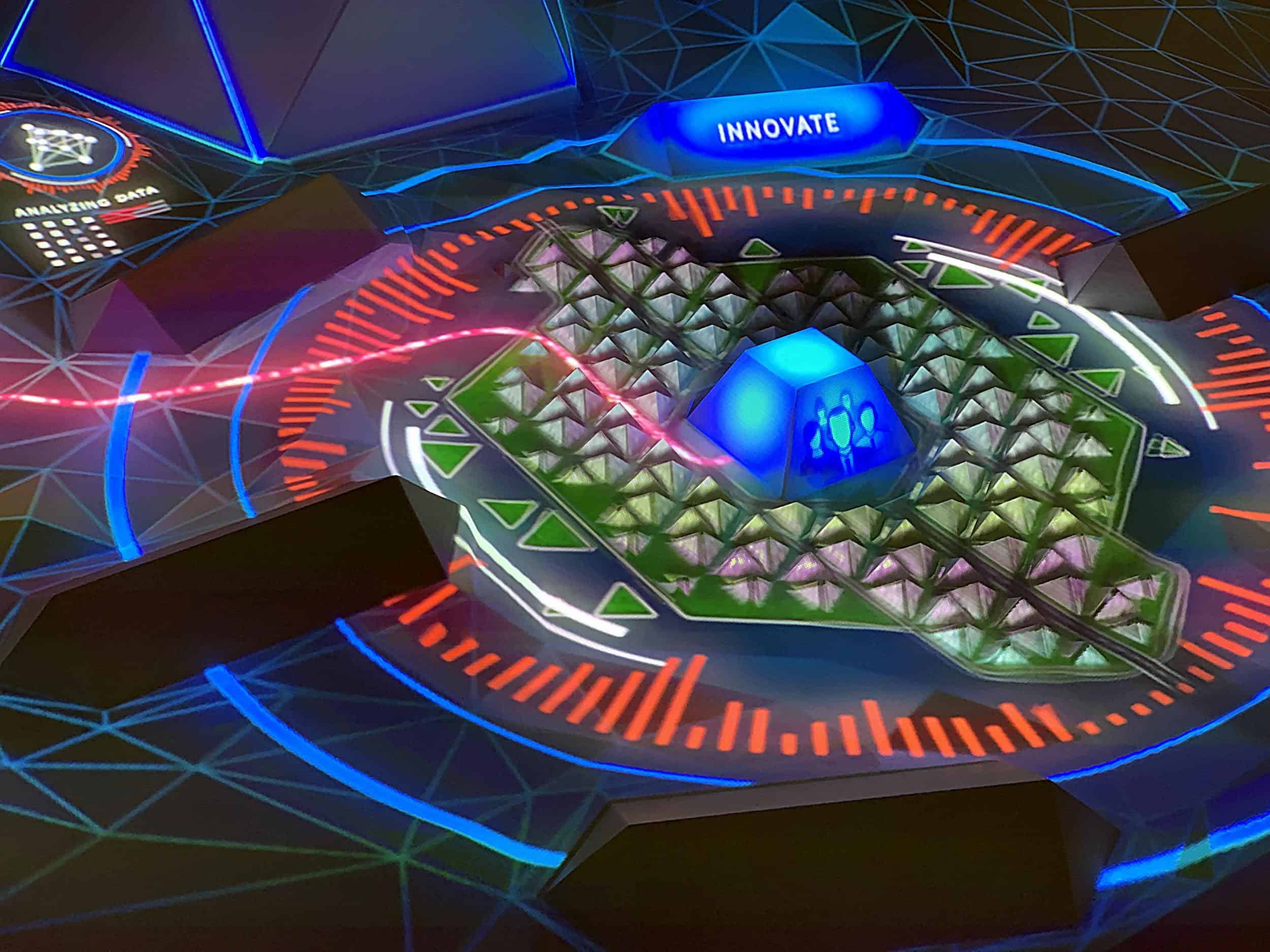 INNOVATE in blue hovers over a holographic 3D terrain model with colorful structures, as a red line sweeps across the digital interface.